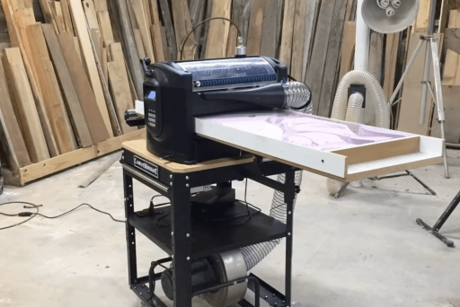 RAVEN CNC feed-through design doing large carvings